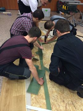  Trainees work on all possible methods of Barlinek engineered floorboards installation