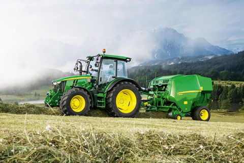 John Deere 5R Series Tractor with JD F441M baller - the attractions put on show at the  company's expo stand at the AGROTECH expo - 17 to 19 March at Targi Kielce