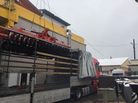 Unloading agricultural machines before the EuroAgro Lviv - the International Agricultural Fair 